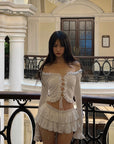 DreamyNerd Rosette Lace-Up Cardigan & Ruffle Mini Skirt Set – Ivory Whimsy