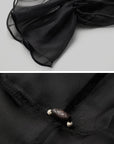 DOINDULGE Draped Mesh Hooded Cardigan with Tassel Accents and Voluminous Sleeves
