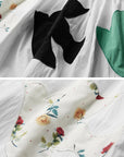 DOINDULGE Bird Patch Panel Maxi Skirt with Raw Volume Silhouette