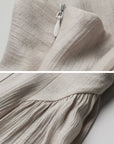 DOINDULGE Draped Maxi Dress with Corset Waist and Rosette Detail