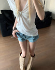 Rase le sol Twisted Deep V Asymmetric Hem Top