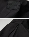 DOINDULGE Wide-Leg Draped Pants with Fringed Panels and Deconstructed Details