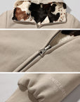 Veste réversible avec maille lisse et tissu pelucheux motif vache