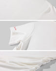 Rase le sol Asymmetric Drape Off-Shoulder Top