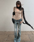 Rase le sol Distressed Low-Rise Flared Denim Pants