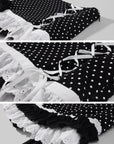 WARDEN EDGE Polka Dot Lace Up Mini Skirt with Ruffled Hem and Asymmetric Layered Detail