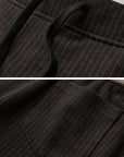 DOINDULGE Pinstripe Wide-Leg Pants with Apron Overlay and Drawstring Waist