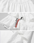 WARDEN EDGE Asymmetric Layered Skirt with Ruffle Detail