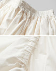 DOINDULGE Layered Cotton Skirt with Asymmetric Draped Hem