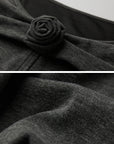 DOINDULGE Draped Knit Top with Rose Detail