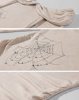Rase le sol Robe courte à épaules dénudées motif toile d'araignée