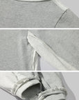 Gray sweatshirt with white trim on a light gray background