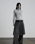DOINDULGE Draped Twist Knit Top with High Neck and Long Sleeves