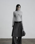 DOINDULGE Draped Twist Knit Top with High Neck and Long Sleeves