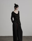 DOINDULGE Asymmetric Drape Long Sleeve Top with Deconstructed Button Design