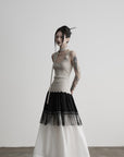 DOINDULGE Fringe Paneled Layered Skirt with Pleats and Contrast Hem