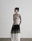 DOINDULGE Fringe Paneled Layered Skirt with Pleats and Contrast Hem