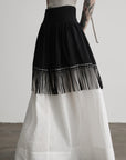 DOINDULGE Fringe Paneled Layered Skirt with Pleats and Contrast Hem