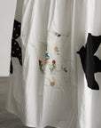 DOINDULGE Bird Patch Panel Maxi Skirt with Raw Volume Silhouette