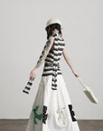 DOINDULGE Bird Patch Panel Maxi Skirt with Raw Volume Silhouette