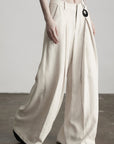 DOINDULGE Raw-Texture Wide-Leg Pants with Hand-Stitched Details