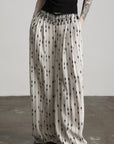 DOINDULGE Embellished Wide-Leg Pants with Beaded Draped Waistline