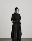 DOINDULGE Wide-Leg Draped Pants with Fringed Panels and Deconstructed Details