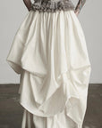 DOINDULGE Layered Cotton Skirt with Asymmetric Draped Hem