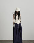DOINDULGE Wide-Leg Pants with Contrast Waistband and Bead Detail