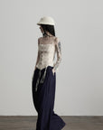 DOINDULGE Wide-Leg Pants with Contrast Waistband and Bead Detail