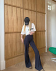 Rase le sol High-Waisted Stretch Flared Pants with Asymmetric Wrap Tie Detail - PINKPARKS