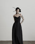 DOINDULGE Draped Maxi Dress with Corset Waist and Rosette Detail