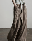 DOINDULGE Draped Asymmetric Wide-Leg Trousers in Textured Stripe