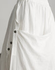 DOINDULGE Asymmetric Draped Skirt with Side Button Detail and Textured Cotton Layers