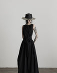 DOINDULGE Sleeveless Draped Maxi Dress with Hand-Tied Bead Embellishment and Sculpted Waist