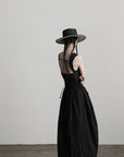 DOINDULGE Sleeveless Draped Maxi Dress with Hand-Tied Bead Embellishment and Sculpted Waist