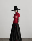 DOINDULGE Black Pleated Skirt Red Button Accents