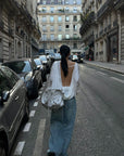 ROVENTE Draped Open Back Long Sleeve Top with Adjustable Strap