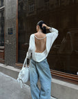 ROVENTE Draped Open Back Long Sleeve Top with Adjustable Strap