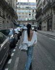 ROVENTE Draped Open Back Long Sleeve Top with Adjustable Strap