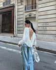 ROVENTE Draped Open Back Long Sleeve Top with Adjustable Strap