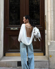 ROVENTE Draped Open Back Long Sleeve Top with Adjustable Strap