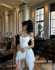 WARDEN EDGE Asymmetric Ruffled Mini Dress with Corset Detailing and Off-Shoulder Straps
