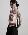 DOINDULGE Embroidered Halter Top with Floral Motif and Beaded Hem Detailing