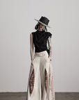 DOINDULGE Asymmetric Textured Sleeveless Top with Frayed and Beaded Detailing