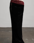 DOINDULGE Draped Velvet Skirt with Sheer Red Waist Detail