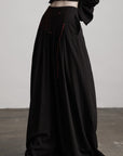 DOINDULGE Wide-Leg Trousers with Red Stitch Detailing