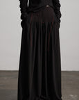 DOINDULGE Wide-Leg Trousers with Red Stitch Detailing