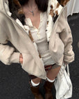 Veste réversible avec maille lisse et tissu pelucheux motif vache