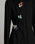 DOINDULGE Diamond Knit Asymmetric Top with Crochet Floral Details